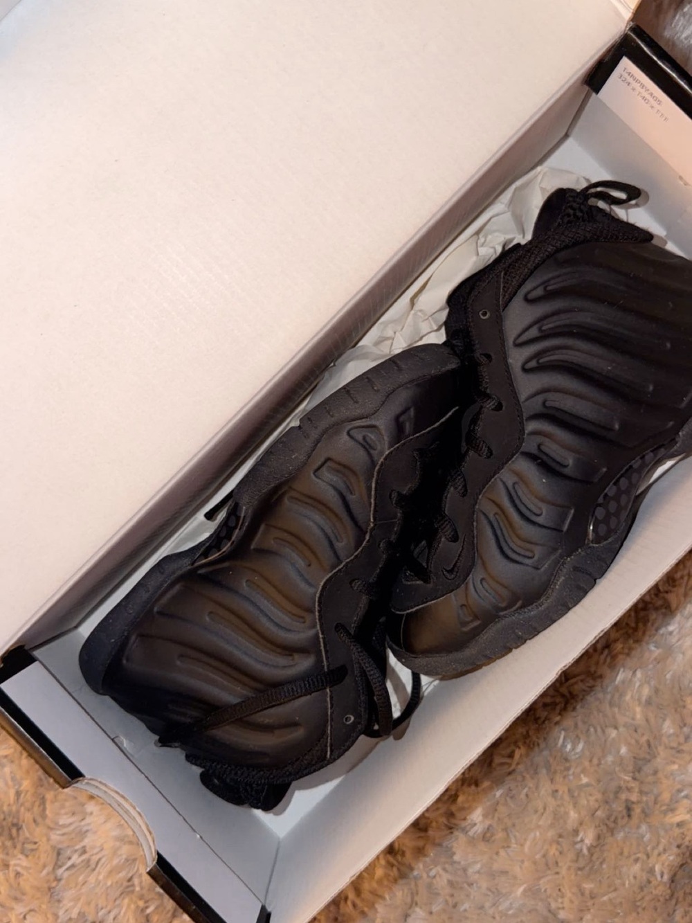 Nike Kids Black Foamposite sneakers